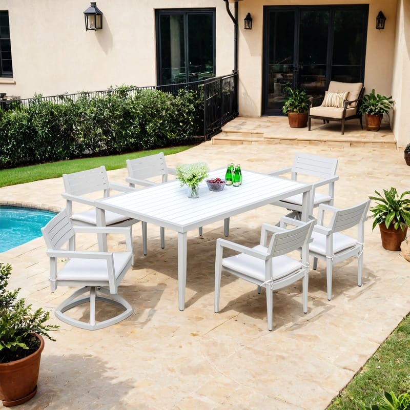 7-Piece Aluminum Patio Set – 4 chairs, 2 swivel rockers (Sunbrella cushions),and a white/gray two-tone table with umbrella hole.