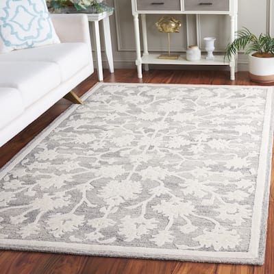 SAFAVIEH Hand-Tufted Ebony Moonika Modern & Contemporary Wool Rug