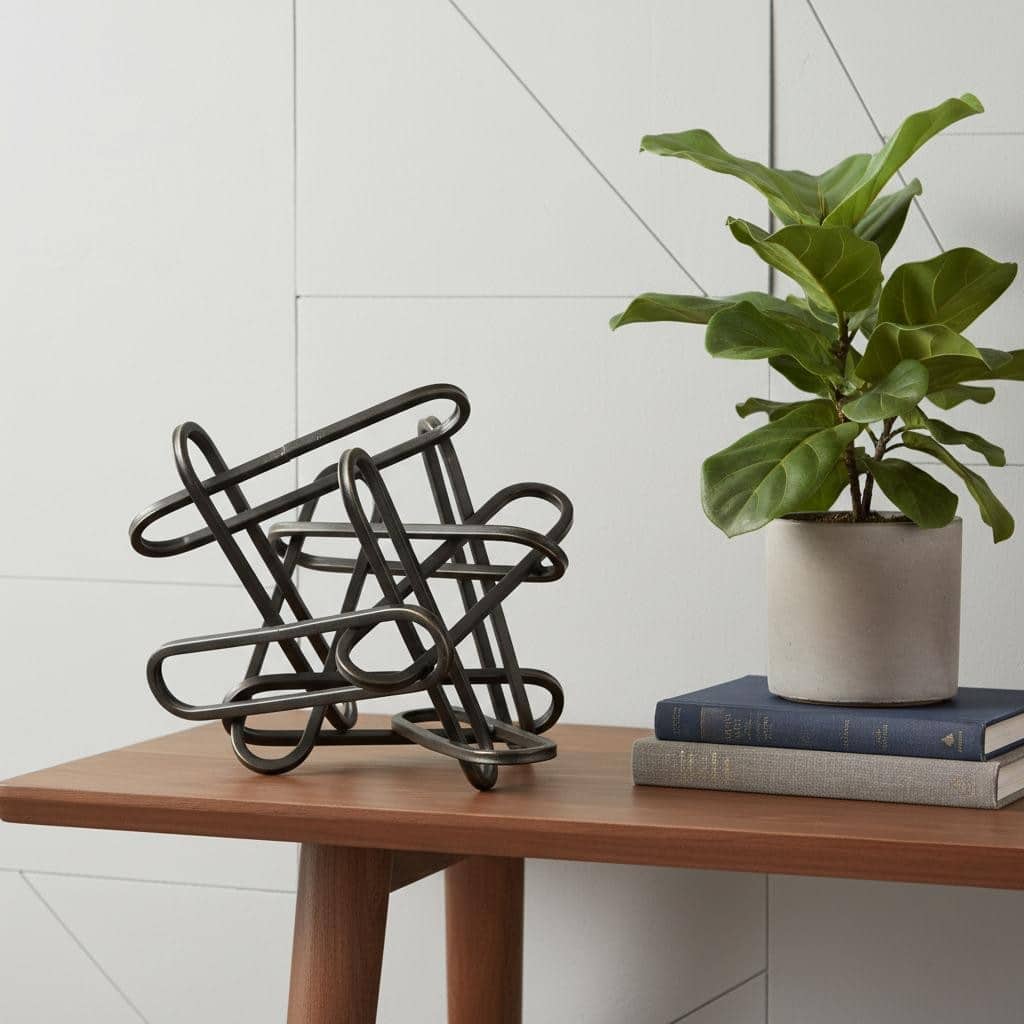 HomeRoots 8" Black Metal Abstract Tabletop Sculpture - 10.43 in. x 7.68 in. x 8.27 in.