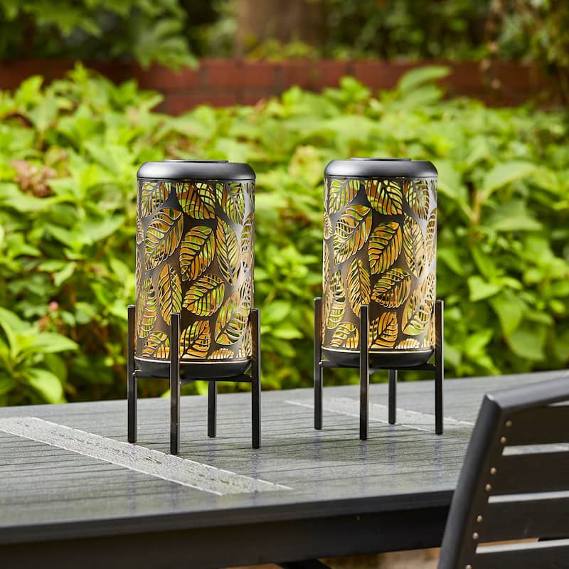 Glitzhome 14.25"H Set of 2 Metal Flower Cutout Solar Lanterns Floor Lantern
