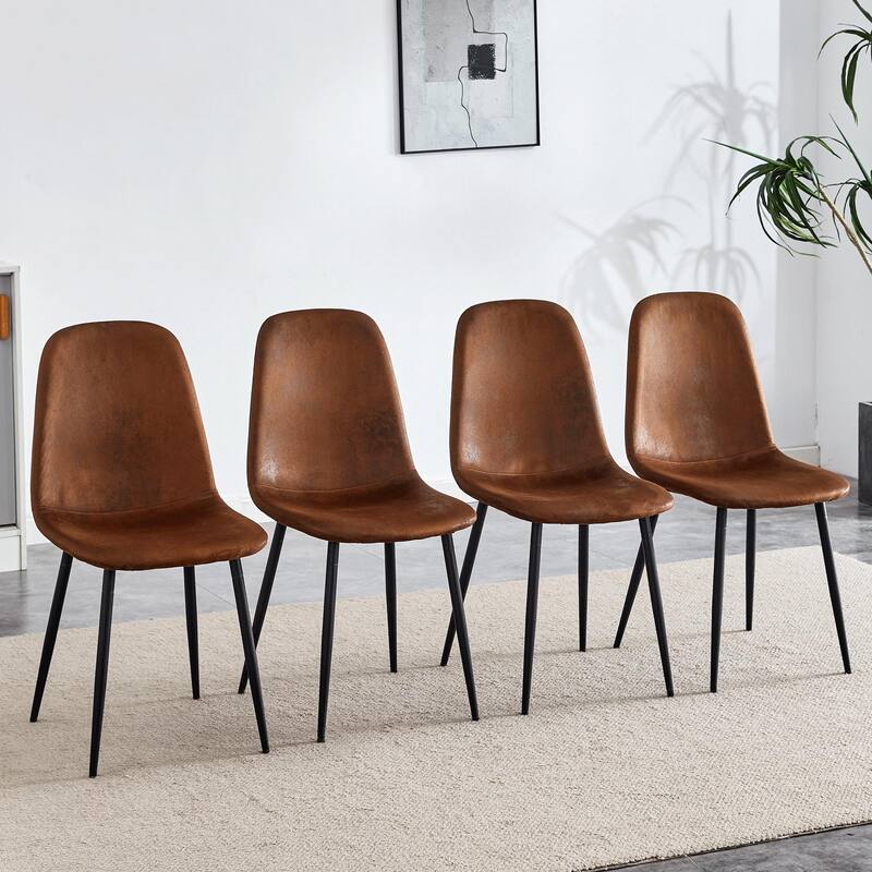 A set of 4 white PU material bow-shaped chairs - Adding fashion to minimalist and contemporary home styles