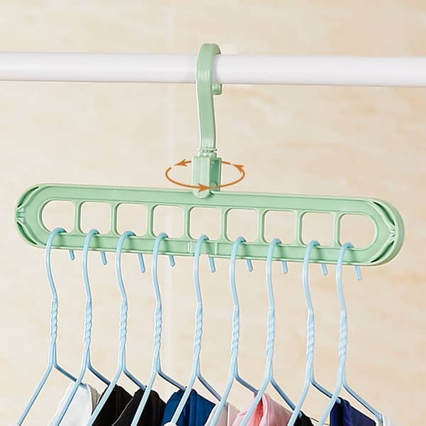 https://ak1.ostkcdn.com/images/products/is/images/direct/d4b3a10779a49179d5e7e0401d2161a407bf2ccc/9-Hole-Space-Saving-Clothes-Hanger-Drying-Rack-Hanging-Hook-Wardrobe-Organizer.jpg?impolicy=medium