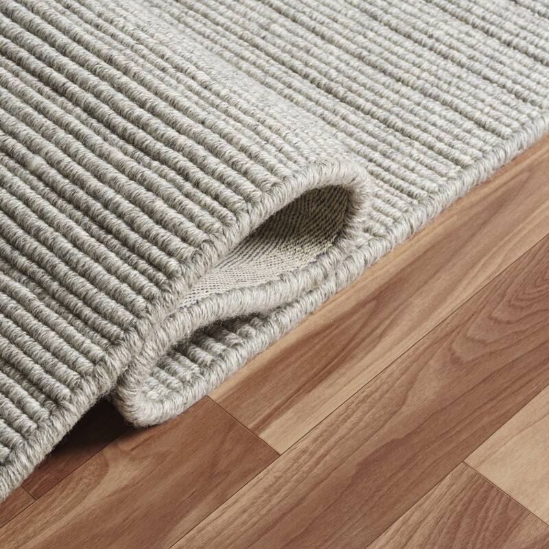Sevita Solid Casual Hand-Woven Woolen Area Rug
