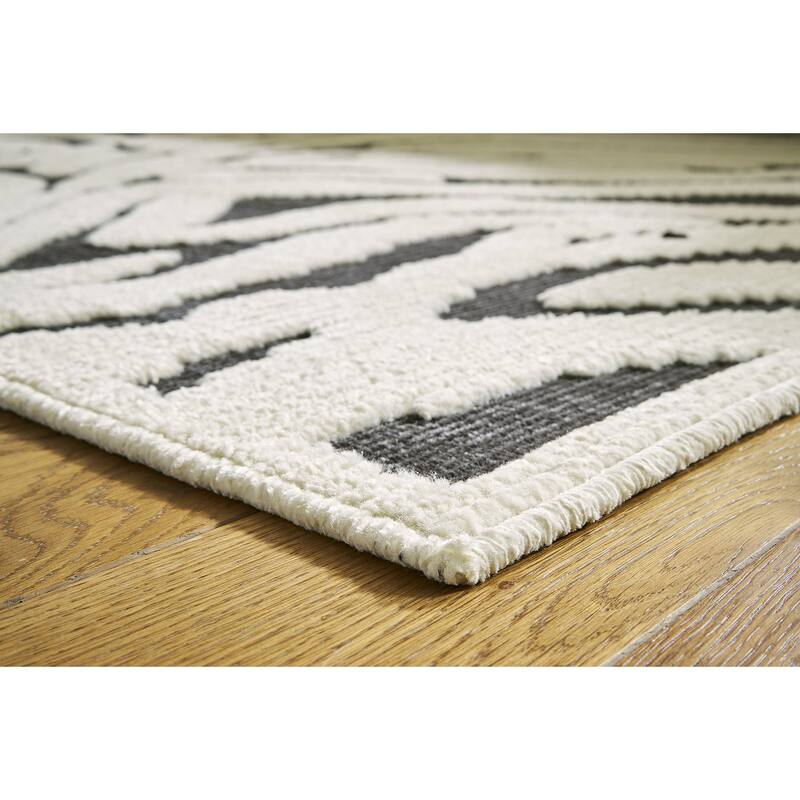 Signature Design by Ashley Thomwith Black/Ivory Rug - 4'11"W x 7'2"D