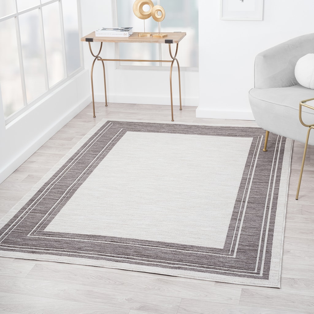 Wron Transitional Solid Ivory/Gray Indoor/Outdoor Area Rug by Sevita