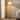 Brightech Squiggle Floor 62.13 in. Classic Black Contemporary Ambient Standing Column Floor Lamp with Ivory Fabric Empire Shade
