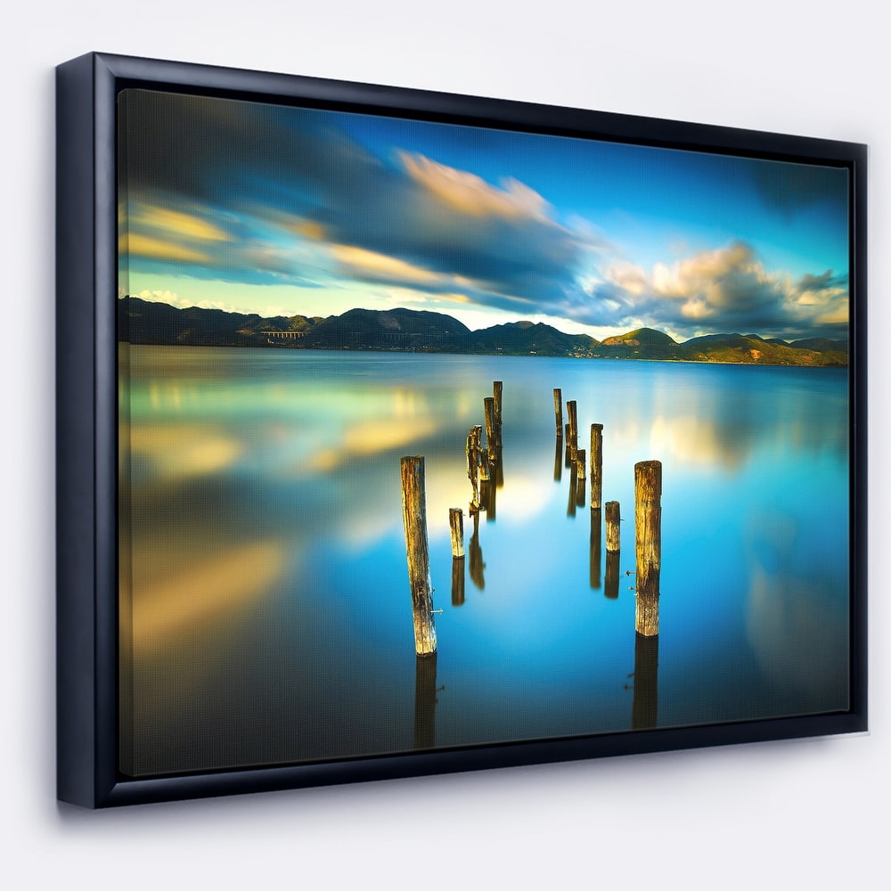 Designart "Cloudy Lake with Broken Pier" Seascape Framed Canvas Art Print