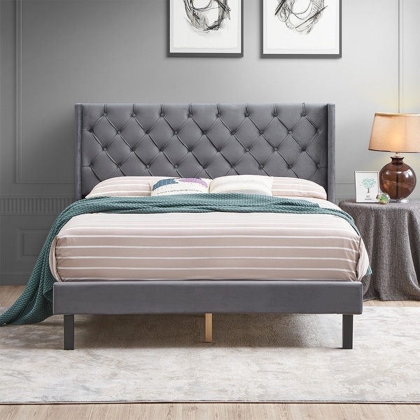 Queen upholstered top wingback bed