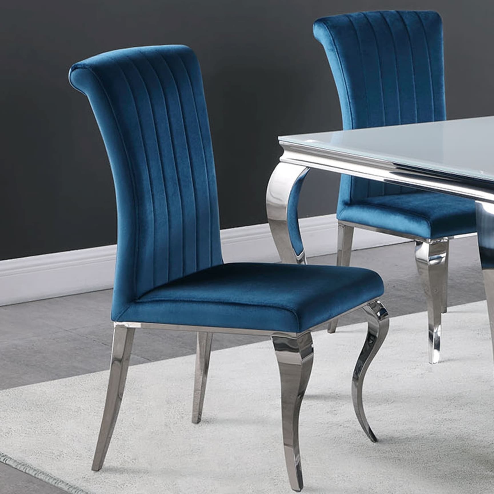 Blue velvet dining chairs with silver legs top
