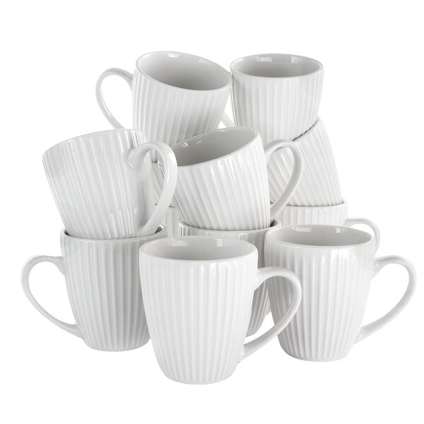 Elama Elle 12 Piece Round Porcelain Mug Set in White. Opens flyout.