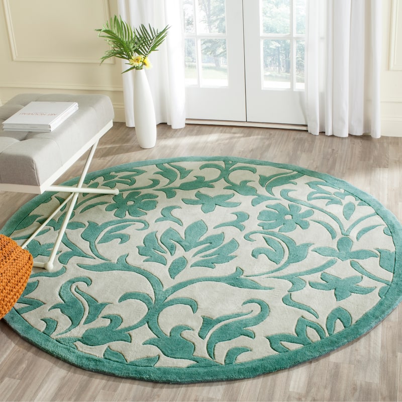 SAFAVIEH Handmade Modern Art Candelaria Modern Polyester Rug - 6'6" Round - Ivory/Light Blue