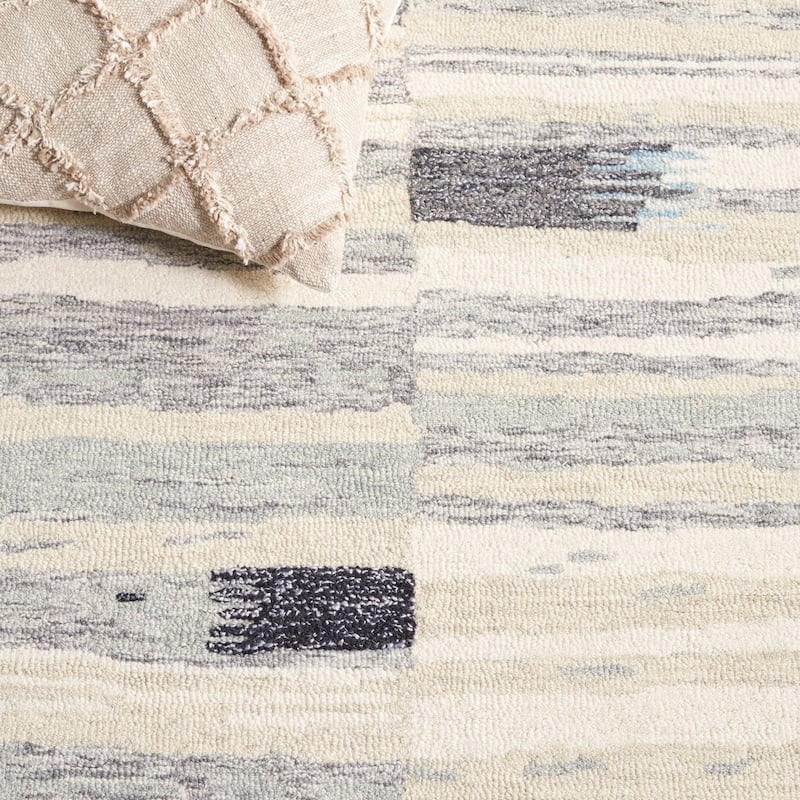 SAFAVIEH Handmade Ebony Bassima Modern Wool Rug