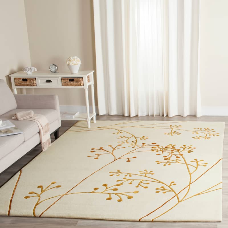 SAFAVIEH Handmade Soho Jesenia Vine N.Z. Wool Rug - 7'6" x 9'6" - Ivory/Orange