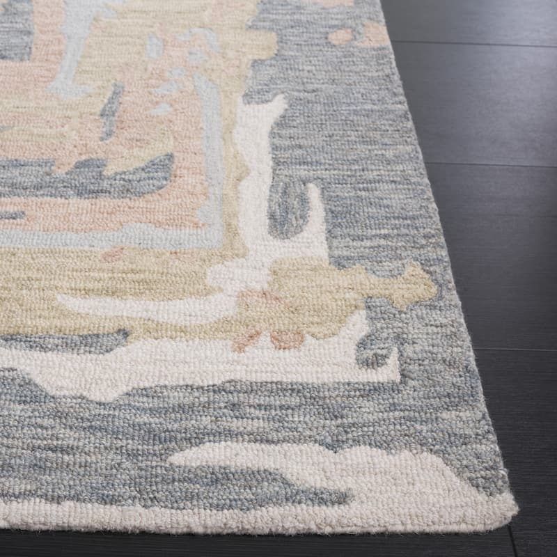 SAFAVIEH Handmade Ebony Taniusa Modern Contemporary Wool Rug