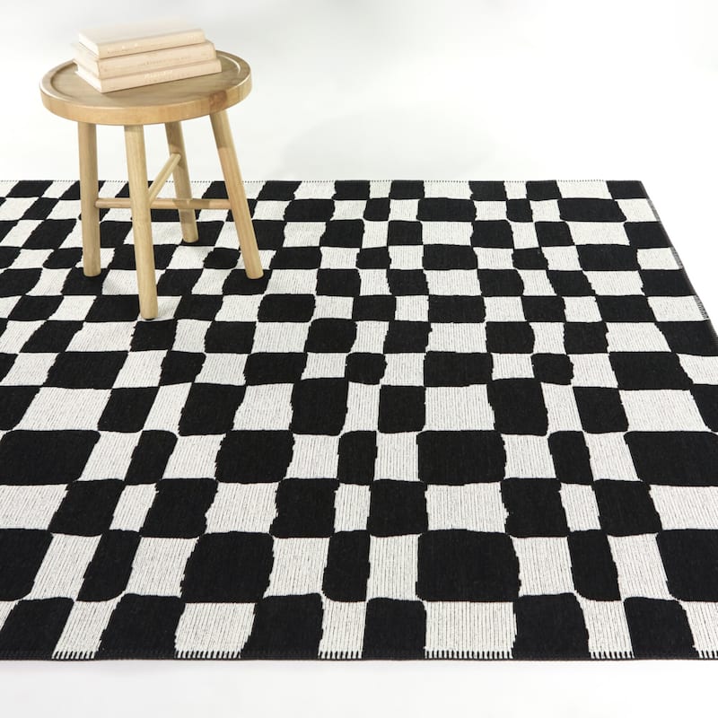 Straker Abstract Checkered Indoor/Outdoor Area Rug - 5'3" x 7' - Black