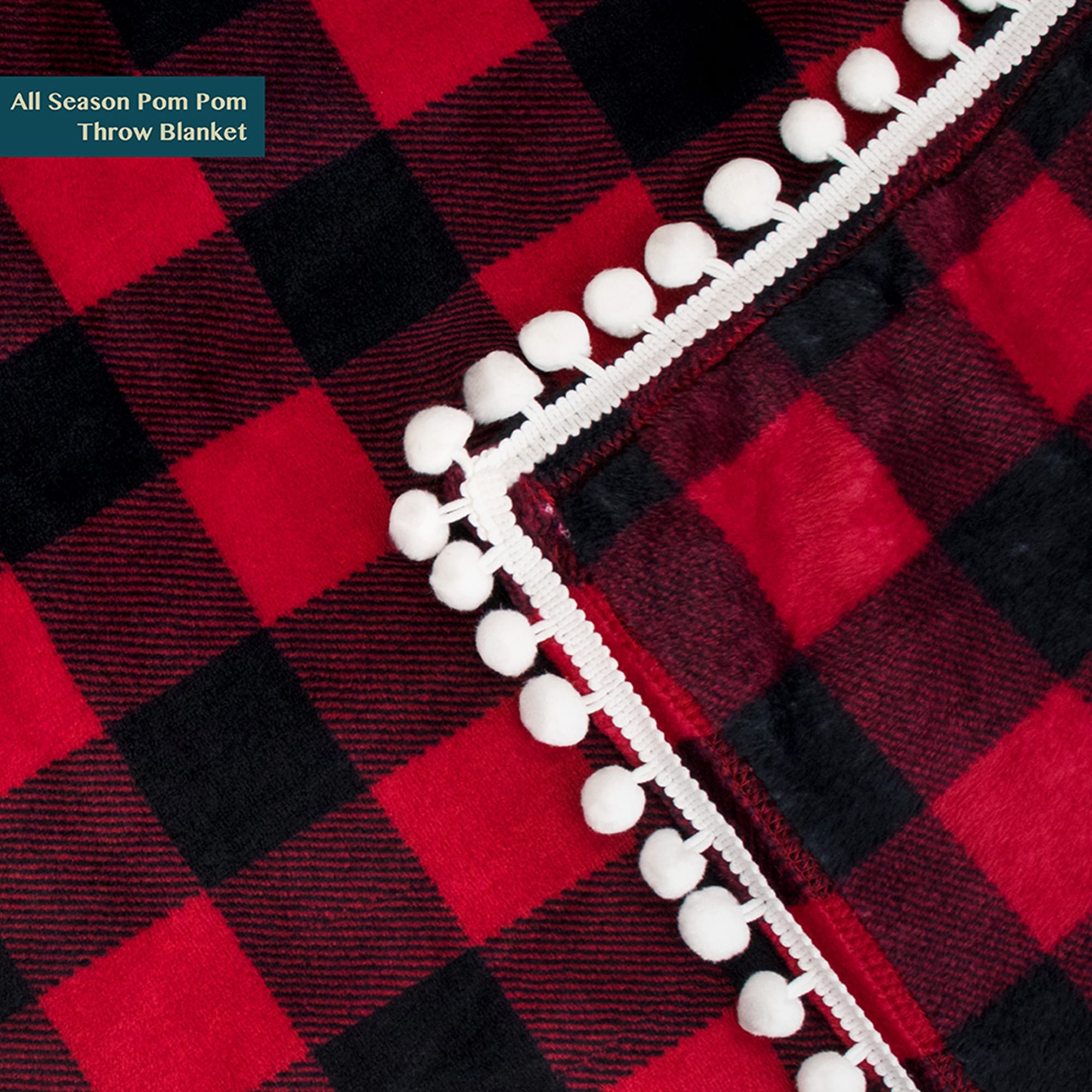 Red pom pom throw blanket top