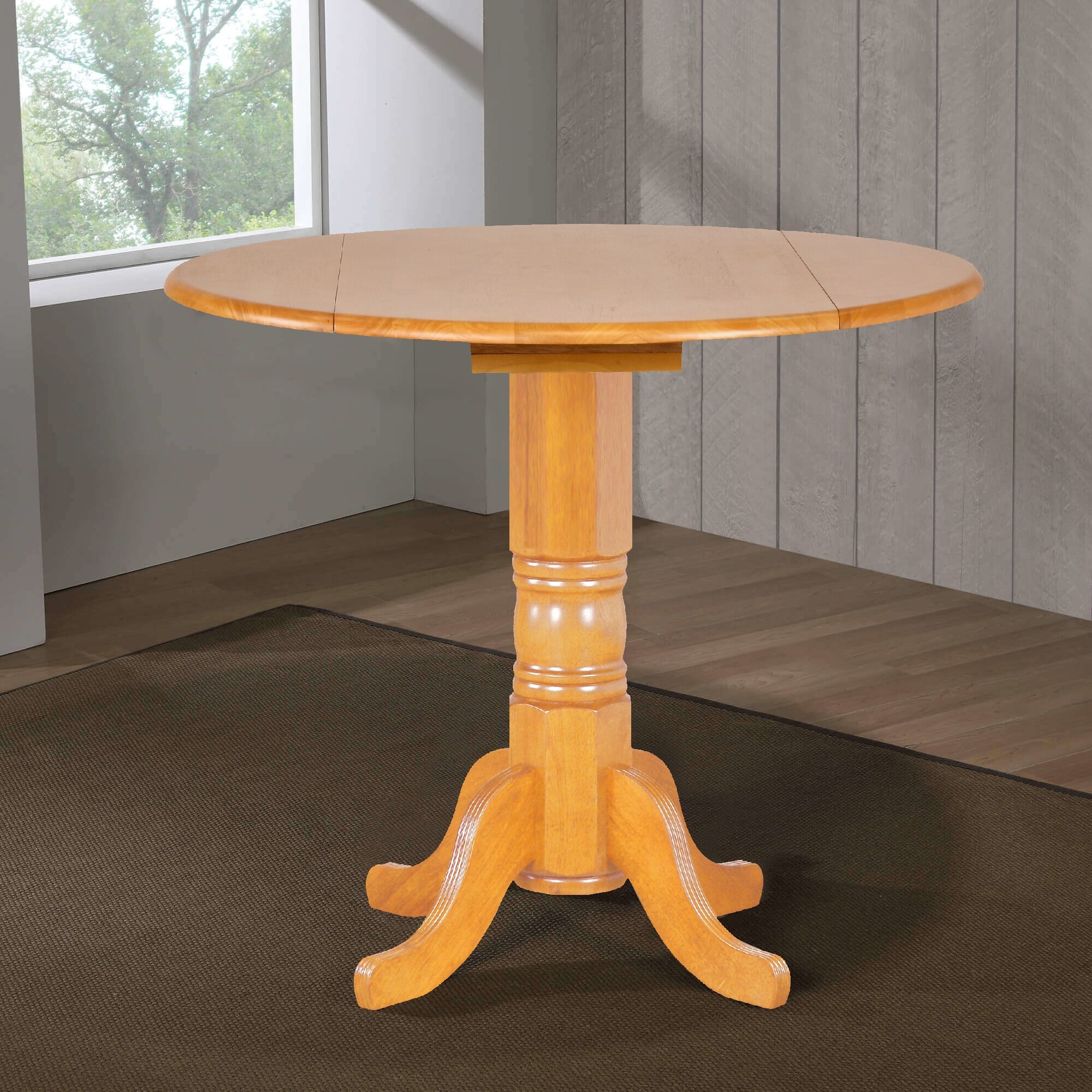 Selections 42 in. Round Extendable Pedestal Light Oak Wood Drop