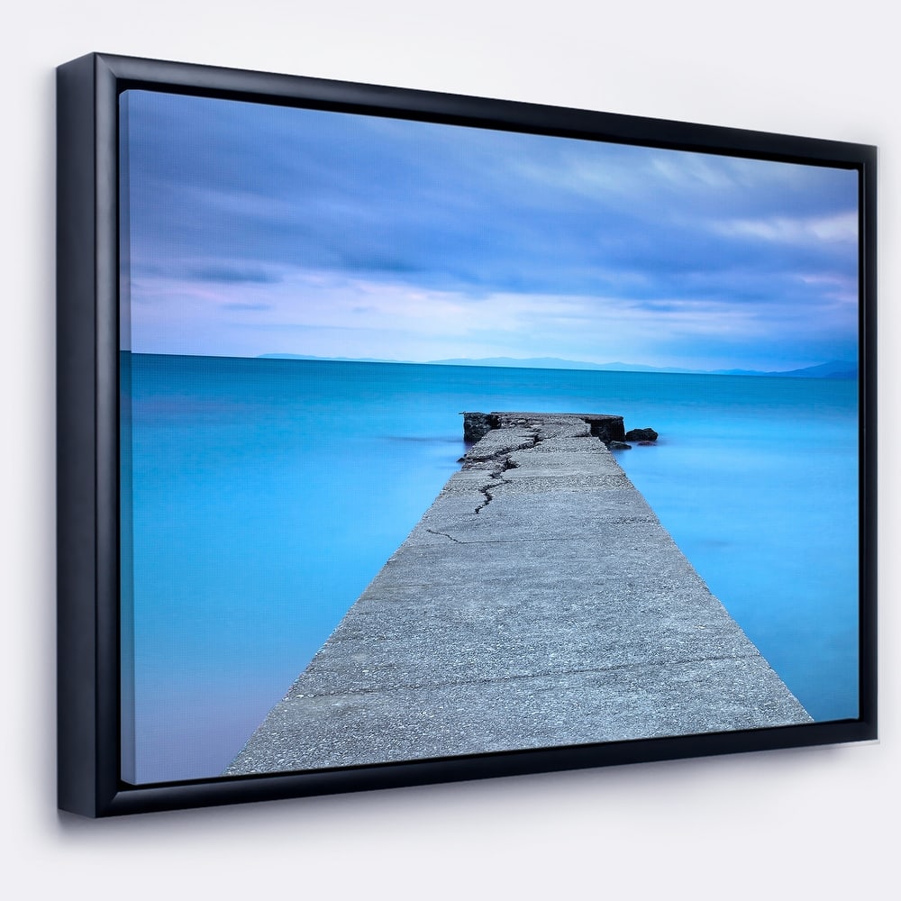 Designart "Broken Concrete Jetty" Seascape Framed Canvas Art Print