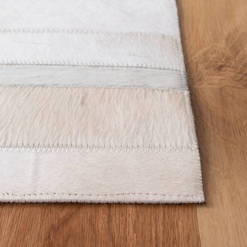SAFAVIEH Handmade Studio Leather Daniele Natural Hide Leather Rug