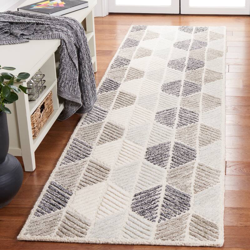 SAFAVIEH Handmade Ebony Sidonie Modern Wool Rug