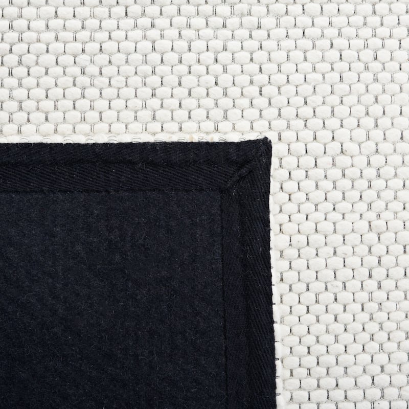 SAFAVIEH Handmade Natura Refiqe Wool Rug