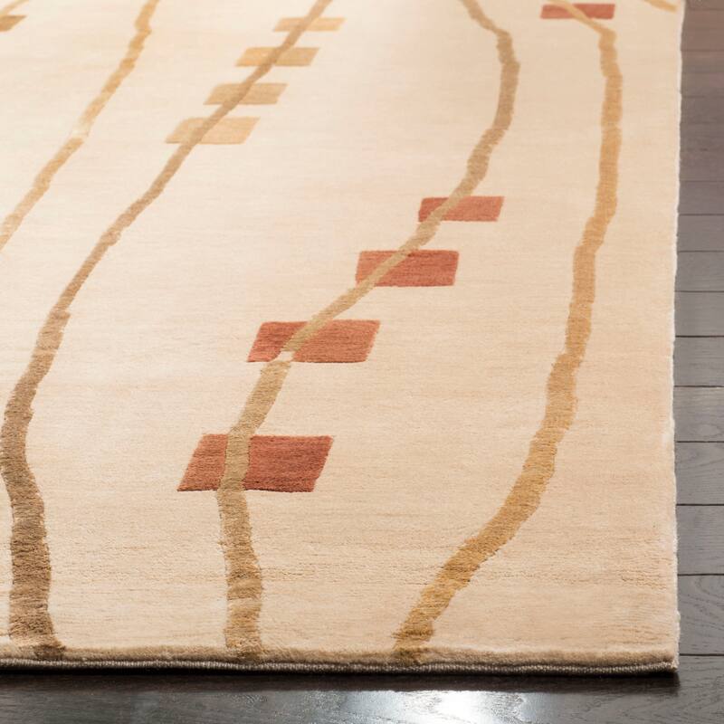 SAFAVIEH Couture Hand-knotted Tibetan Caris Modern Wool Rug