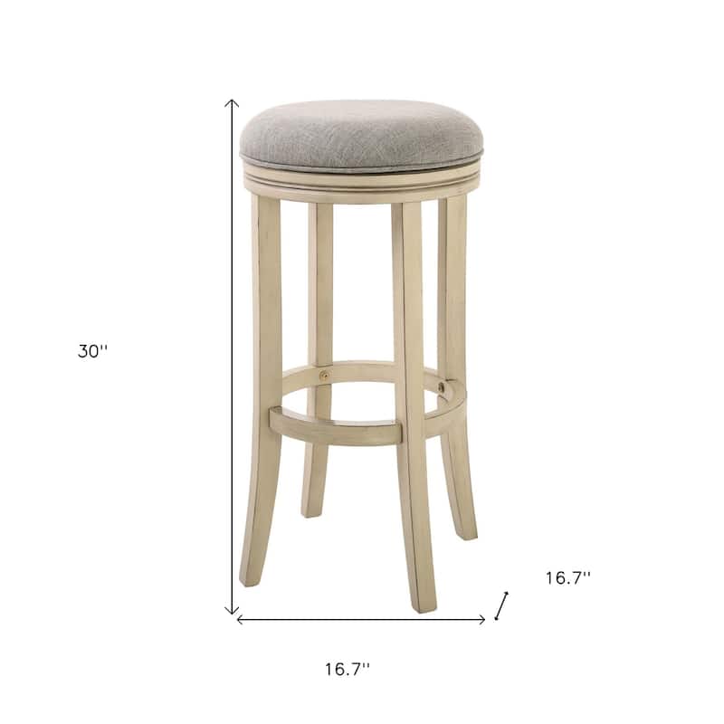 Ivory Wood Swivel Round Bar Stool with Grey Upholstered Seat and Footrest