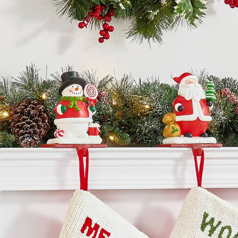 Glitzhome Resin Santa Snowman Penguin Gnomes with JOY Christmas Stocking Holders Mantel Ornament(Set of 3)