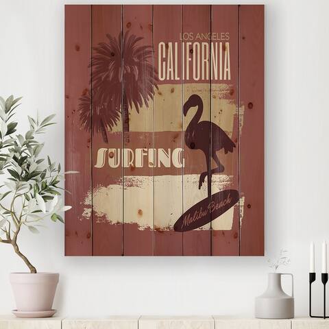 Designart 'California Surfing Silhouette Of FLamingo On Surfboard' Modern Print on Natural Pine Wood