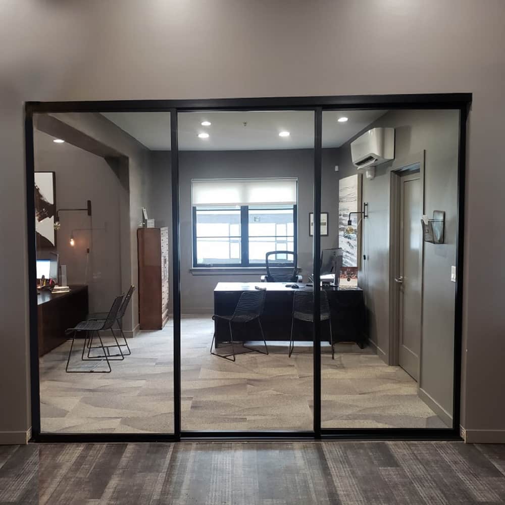 THE SLIDING DOOR COMPANY 3 Panel, Sliding Room Divider, Clear Glass and Aluminum Frame on triple track.