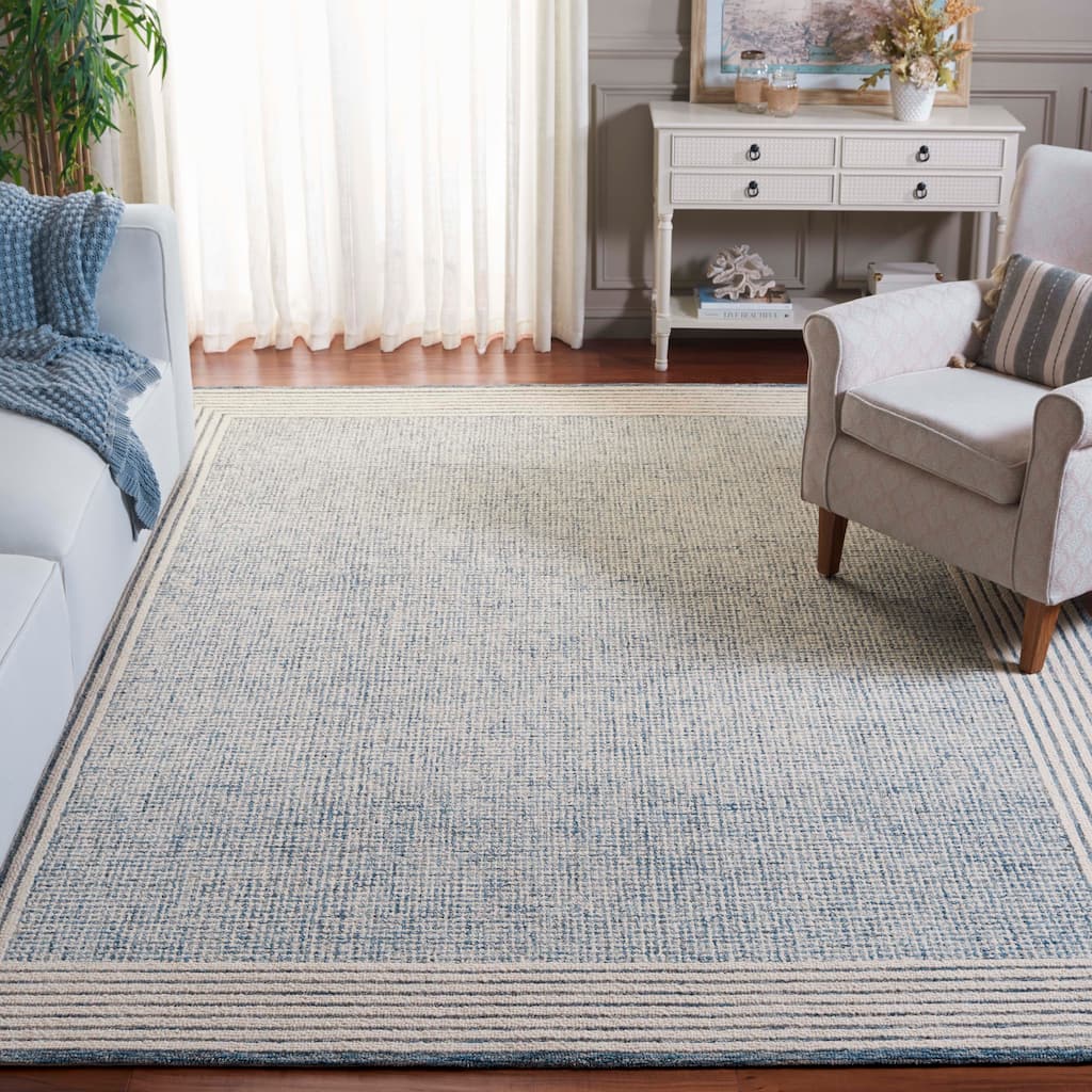 SAFAVIEH Handmade Ebony Dorith Border Wool Rug