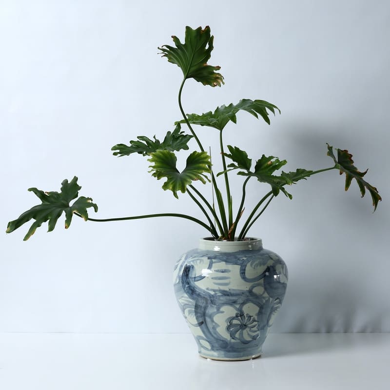 Approx. 13" High Blue and White Jar with Flower Motif