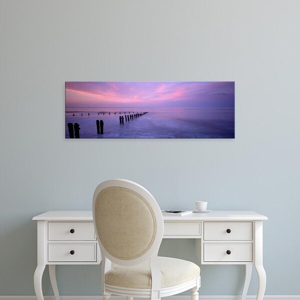 Easy Art Prints Panoramic Images's 'Wooden Posts In Water, Sandsend, Yorkshire, England, United Kingdom' Canvas Art