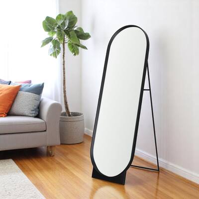 HomeRoots 67" Black Metal Oval Freestanding Tilting Geometric Framed Standing Mirror - 26.50 in. x 67.25 in. x 22.50 in.