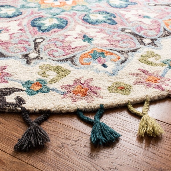 Safavieh Novelty Collection NOV576M Handmade Boho Floral Tassel Wool Area Rug Blue Pink 4' x 4' Round Safavieh Novelty Collection NOV576M Handmade Boho Floral Tassel Wool Area Rug Blue Pink 4' x 4' Round