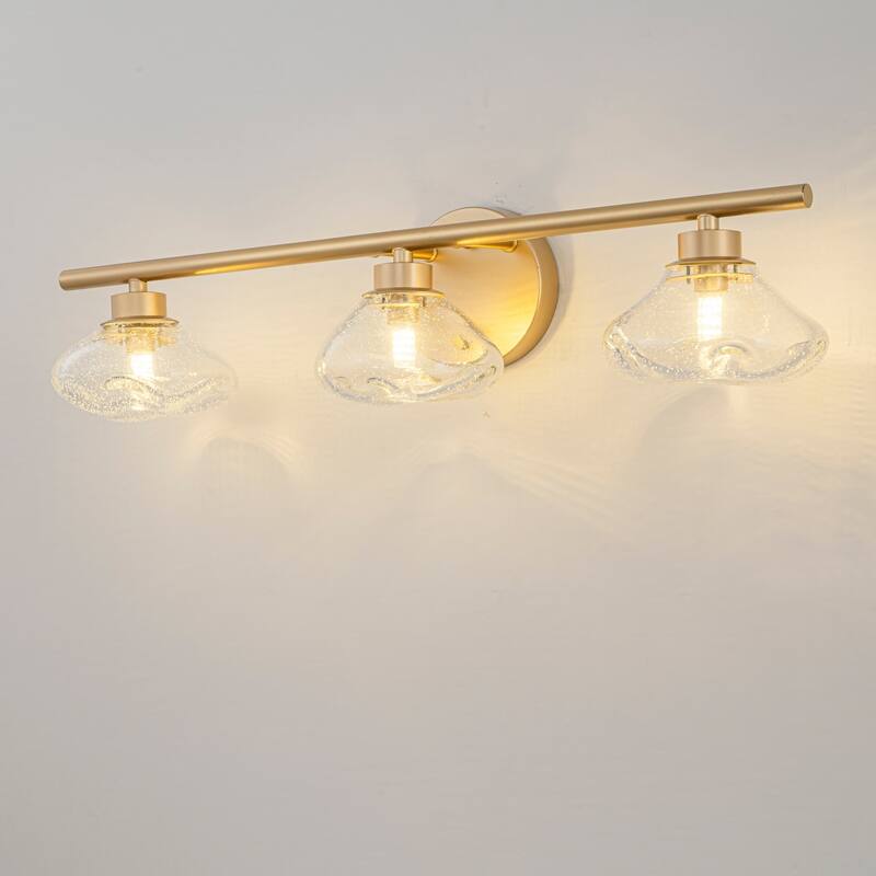 3-Light 24.4" Modern Black/Gold Bathroom Vanity Light with Stone-Shaped Seed Glass Shades - Clear/Gold