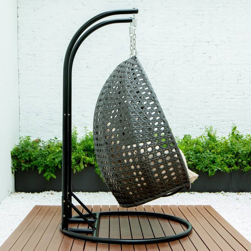 LeisureMod 2-Person Hanging Egg Swing Chair with Metal Stand - Handcrafted Charcoal Wicker, Patio Hammock Lounger with Cushions