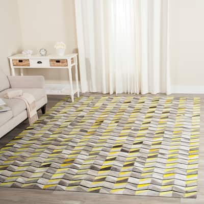 SAFAVIEH Handmade Studio Leather Rachela Modern Leather Rug