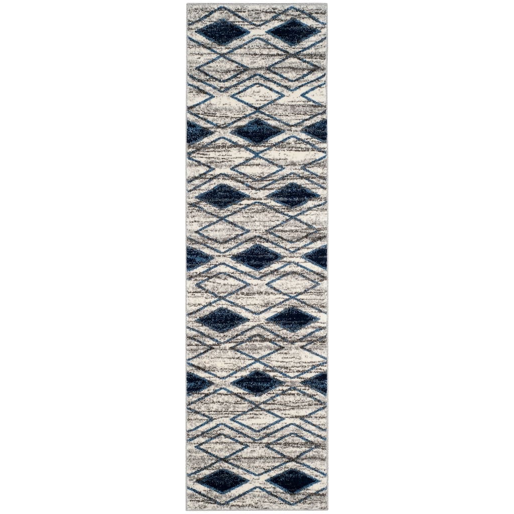 SAFAVIEH Tunisia Arminta Southwestern Rug