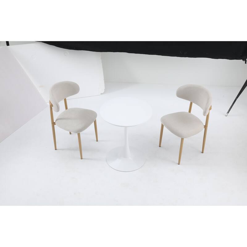 white round dining table with an elegant tulip-shaped steel base and a 24-inch medium-density fiberboard tabletop