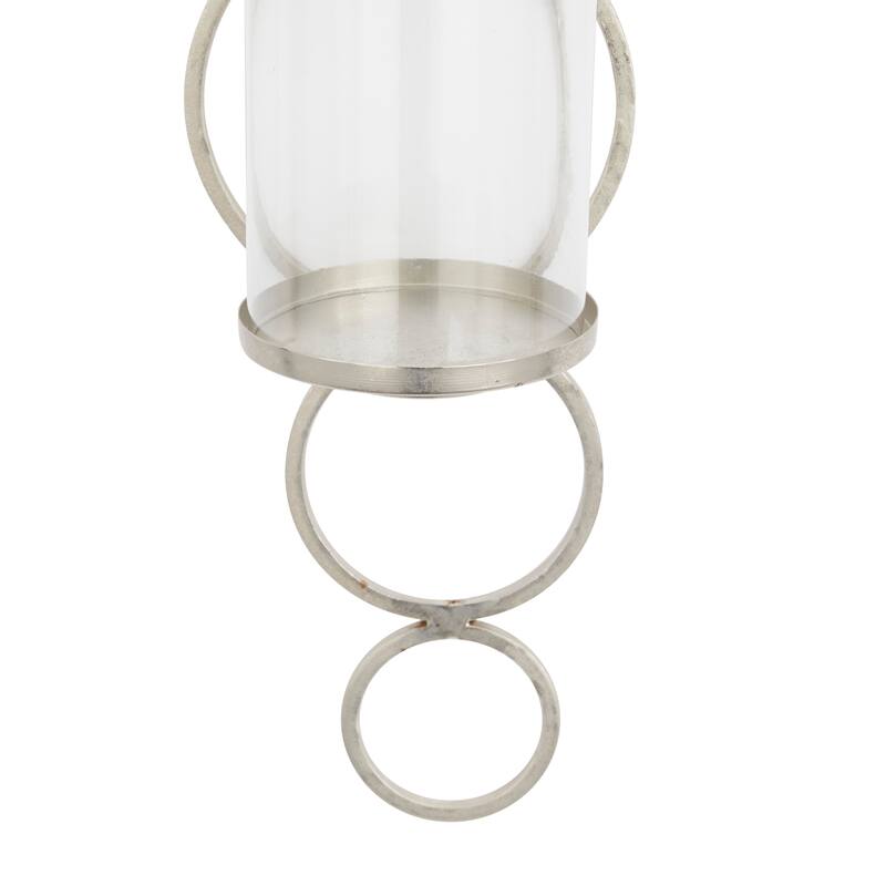 CosmoLiving by Cosmopolitan Metal Stacked Circle Geometric Wall Sconce with Glass Holder - Gold, Black, Silver