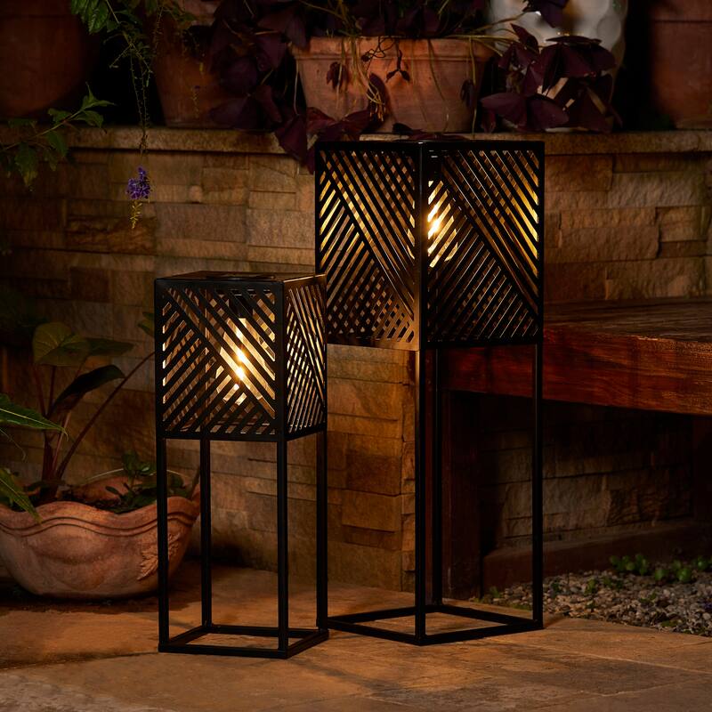 Glitzhome Set of 2 Black Metal Cutout Pattern Solar Powered Edison Bulb Outdoor Floor Lantern or Planter Stands
