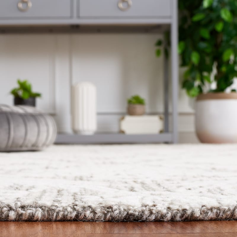 SAFAVIEH Handmade Ebony Fridbjorg Modern Wool Rug