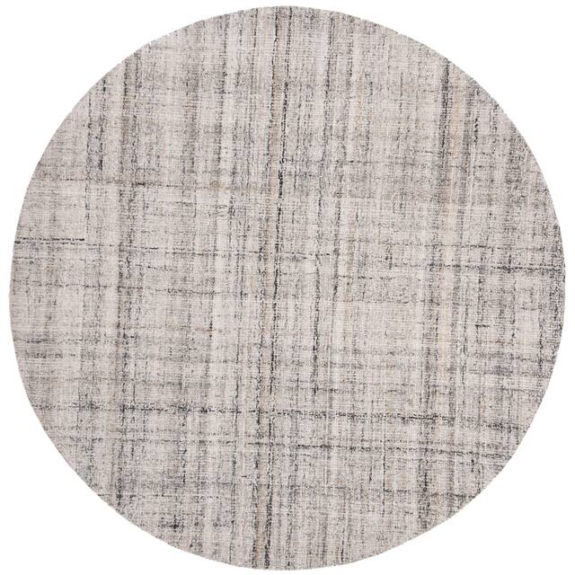SAFAVIEH Handmade Abstract Nettie Modern Viscose Rug - 4' x 4' Round - Camel/Black