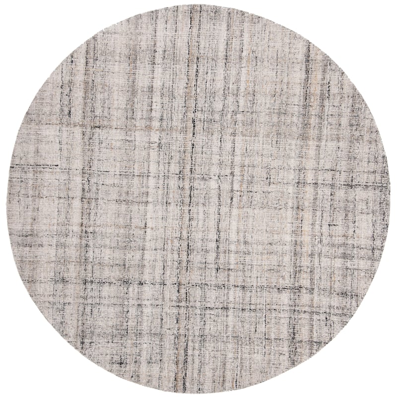 SAFAVIEH Handmade Abstract Nettie Modern Viscose Rug - 4' x 4' Round - Camel/Black