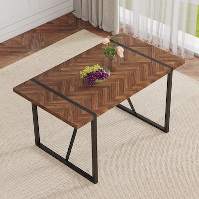A minimalist retro rectangular dining table with a specially textured top and black metal legs