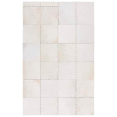 SAFAVIEH Handmade Studio Della Leather Modern Rug