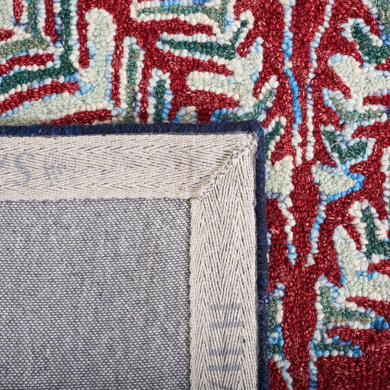 SAFAVIEH Handmade Capri Ilianka Wool Rug