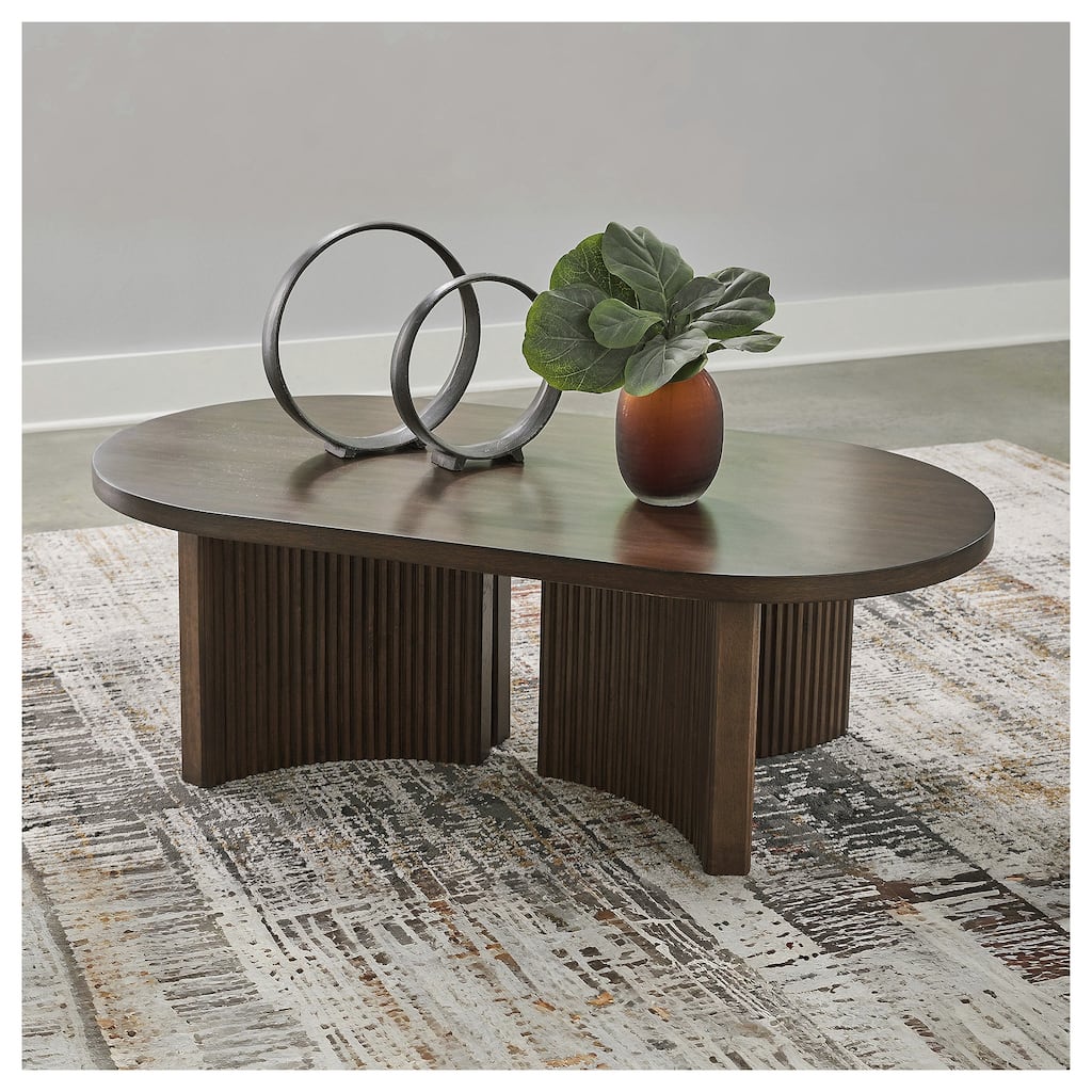 Signature Design by Ashley Korestone Dark Brown Coffee Table - 52"W x 28"D x 17"H