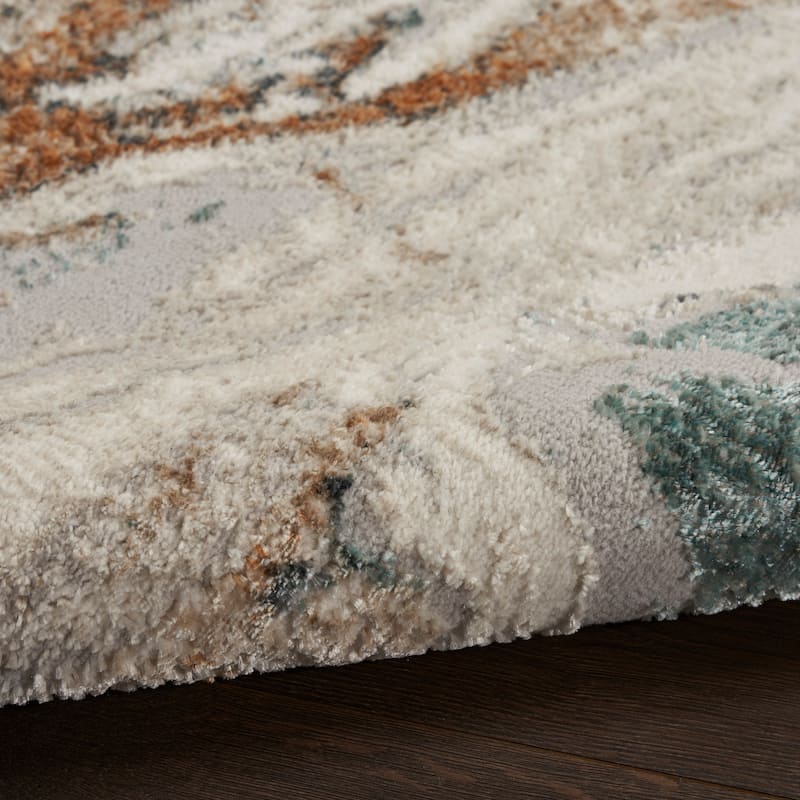 Nourison Illusion Indoor only Cream / Ivory Abstract Area Rug - 5' 3" x 7'